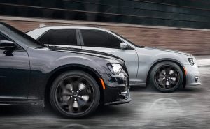 Two Chrysler 300 Cars Driving
